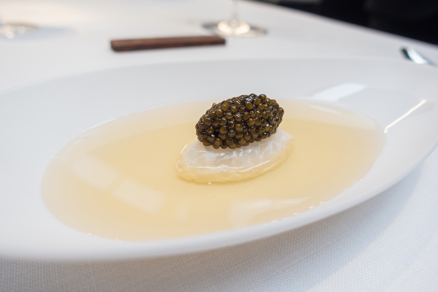 Cured Squid, Poultry consommé and caviar. Surf and turf.