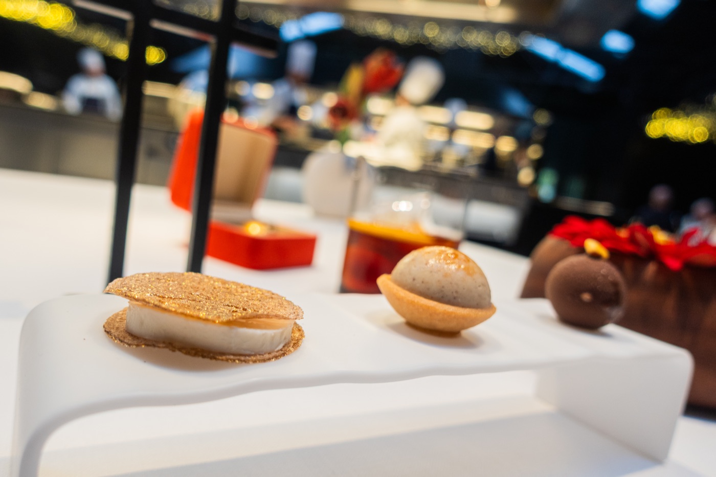 Sweets on the white riser, the Rosemary ice cream sandwich in front.