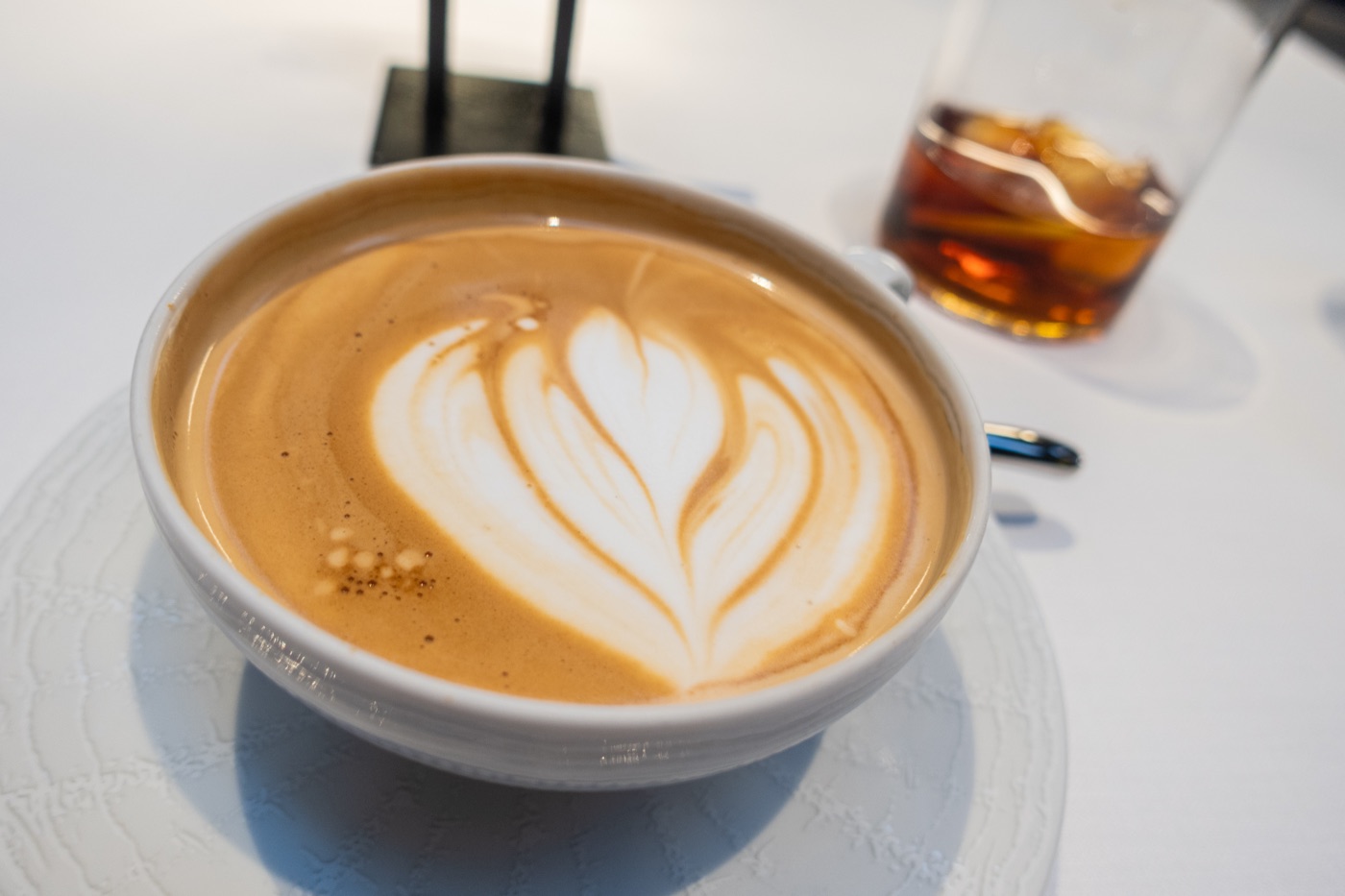 Coffee, with a latte-art heart.