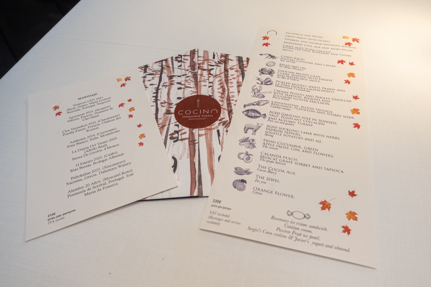 The tasting menu beside the wine pairing card.