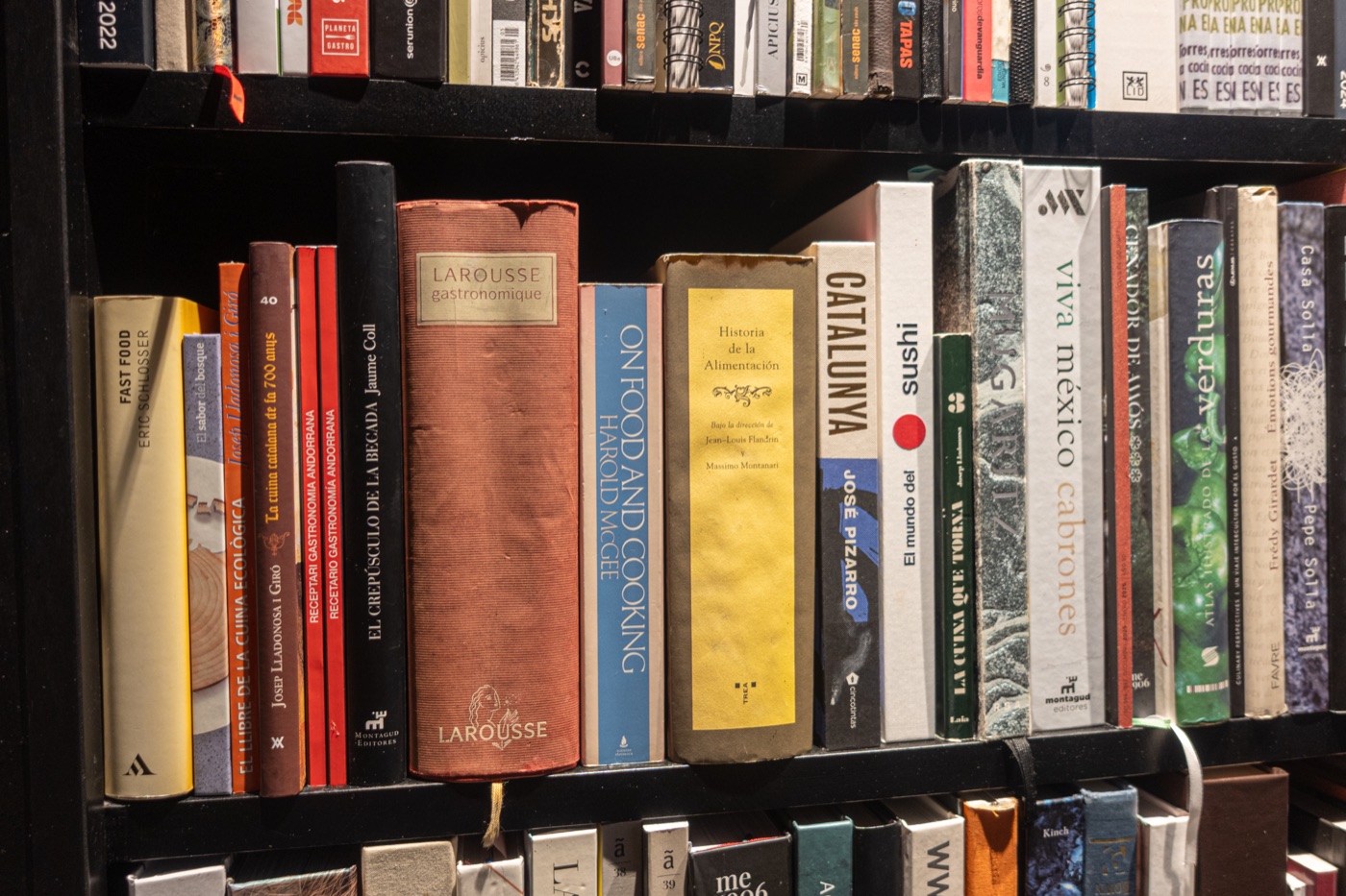 A shelf of cookbooks.